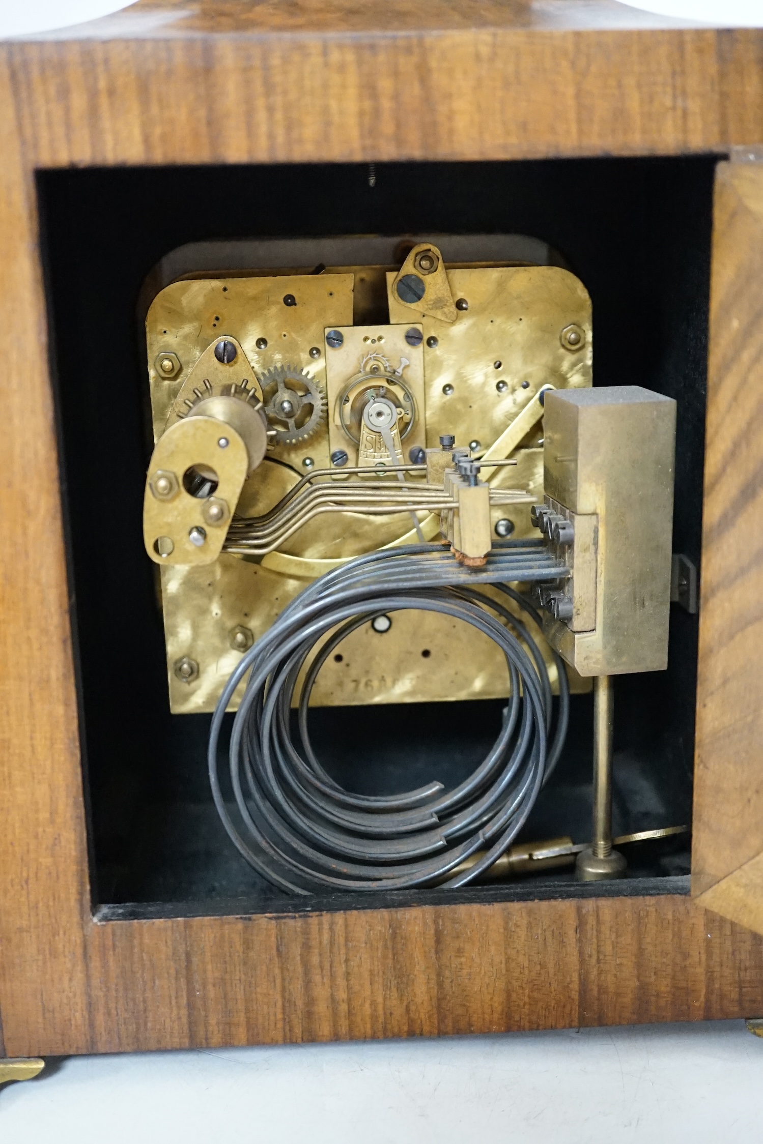 A Mappin & Webb walnut mantel clock, with key, 28.5cm high. Condition - case good, not tested